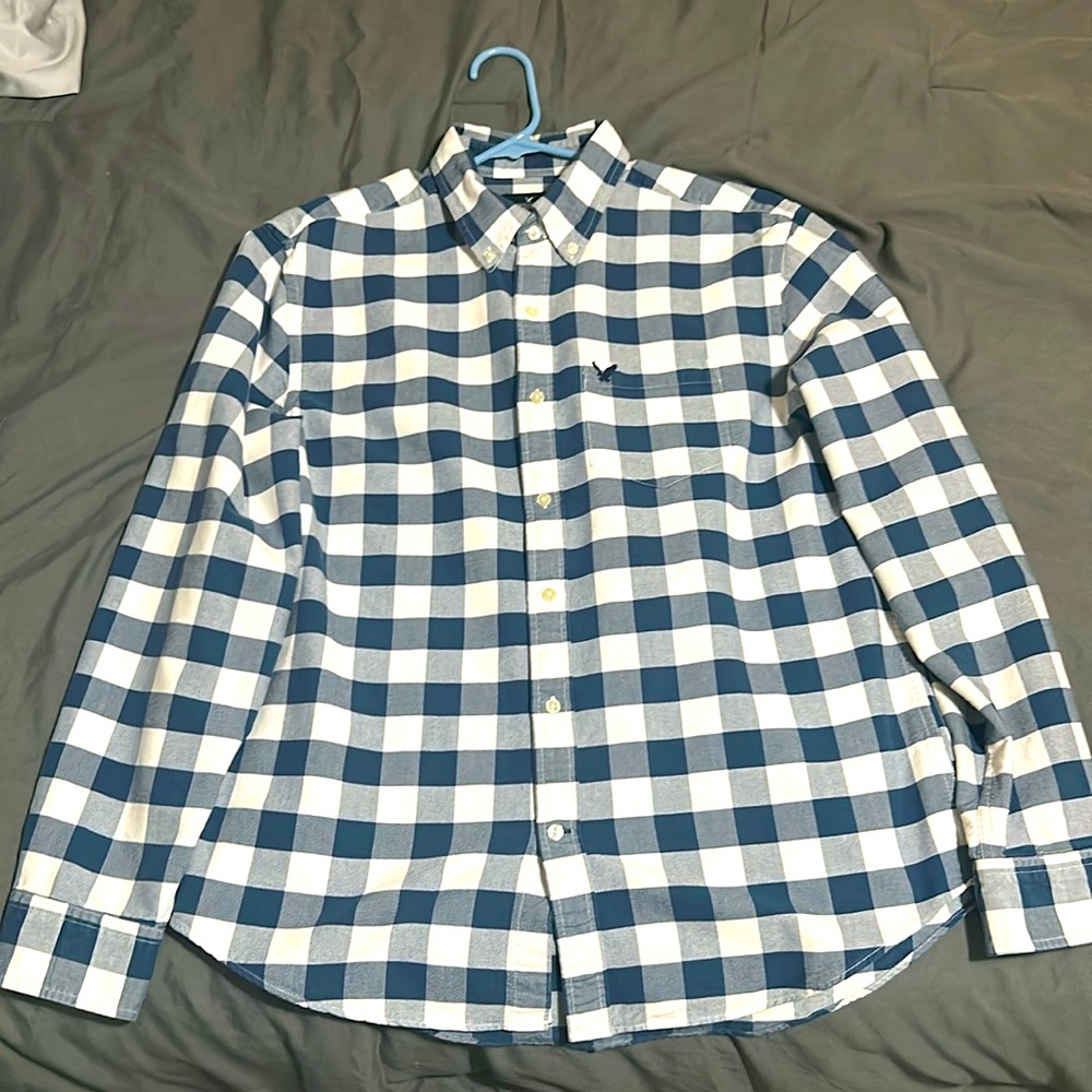 White and blue American Eagle button up. Size large.